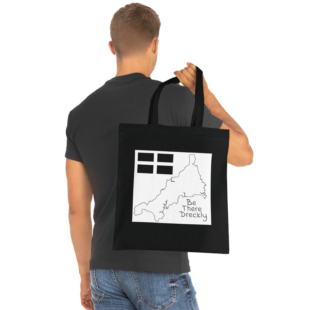 Black Cornish dialect tote bag with St Piran flag design — Be There Dreckly shopper