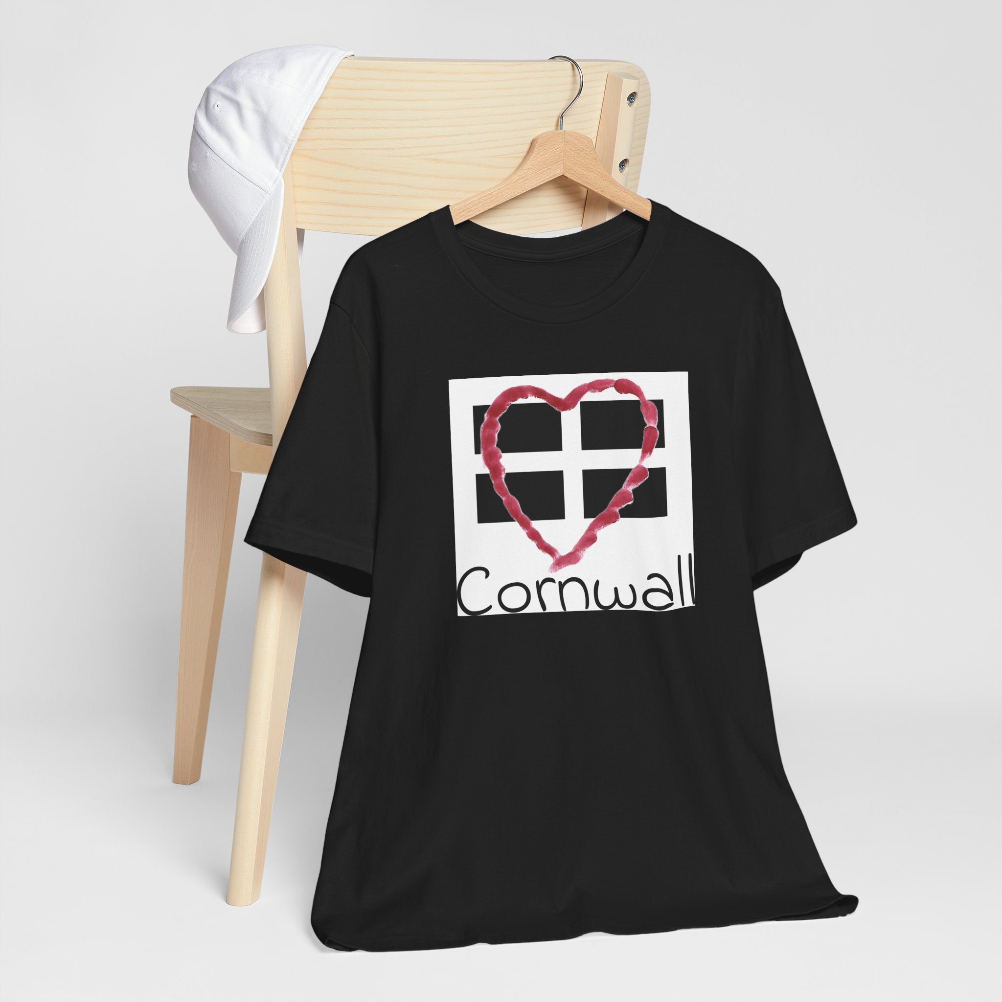 Black Cornwall Heart Flag t-shirt on hanger, St Piran flag design tee