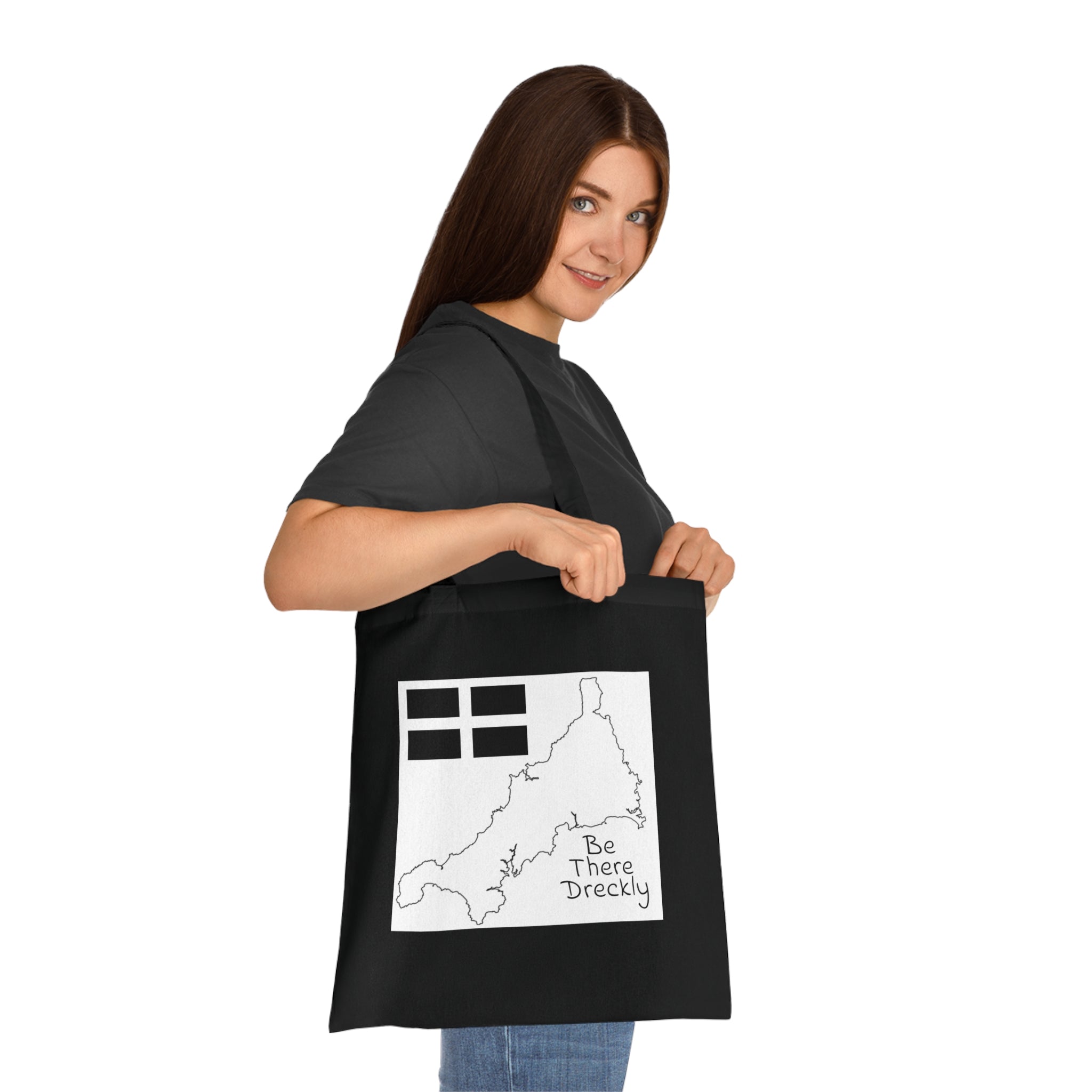 Black Cornwall dreckly tote bag worn over shoulder — Cornish gift cotton shopper