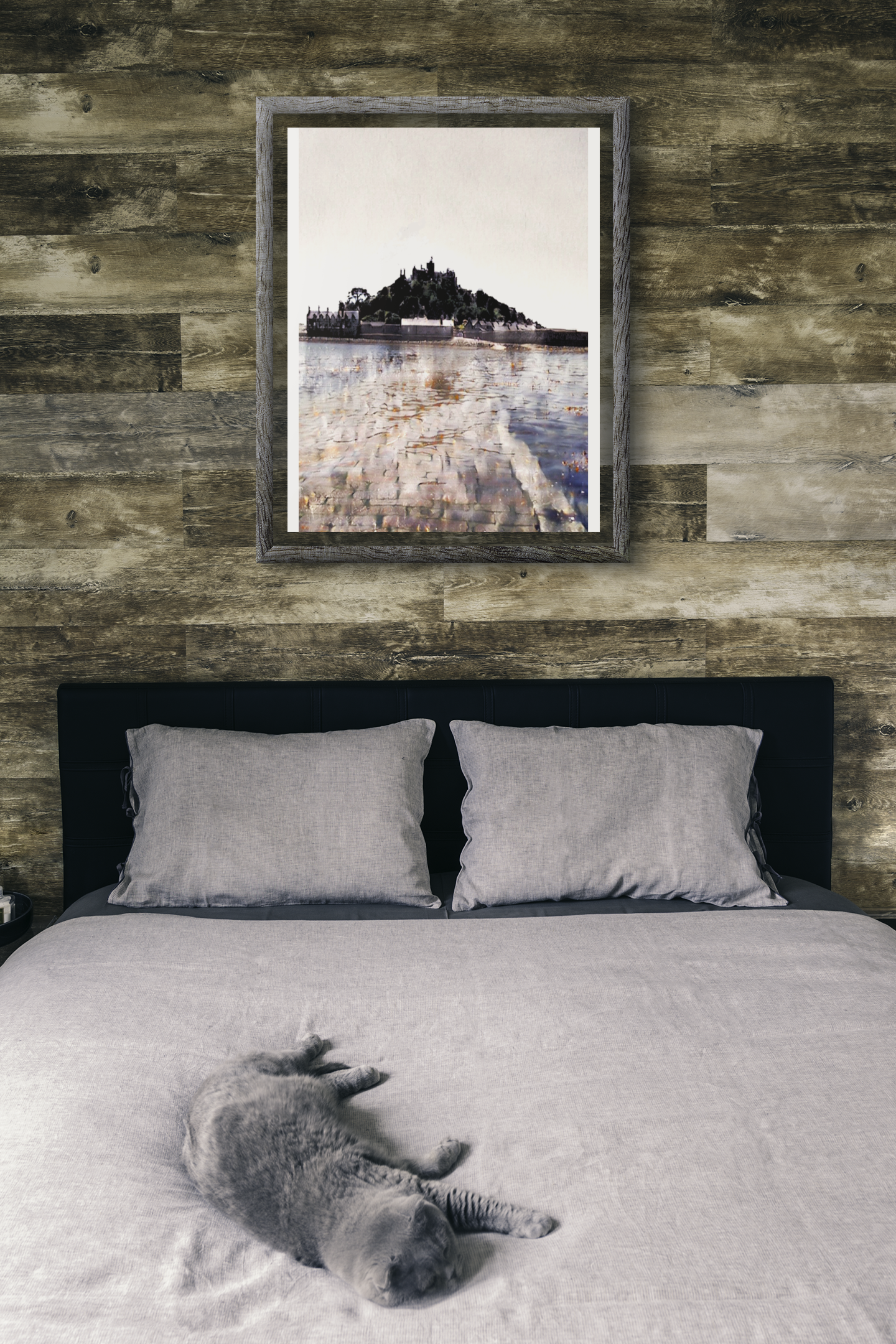 Cornwall seascape wall art above bed in calm blue-grey bedroom interior