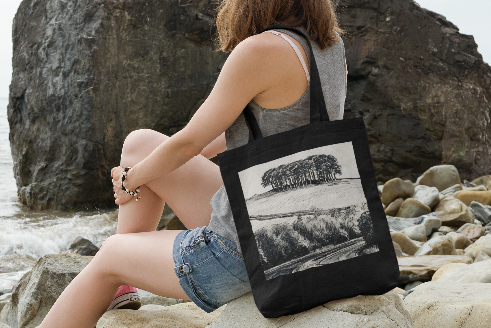 Cornwall tote bag on rocks at the beach, Nearly There Trees design