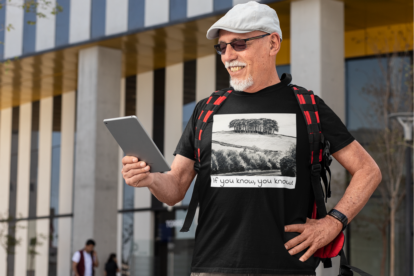 Man wearing Black Nearly There Trees Cornwall t-shirt, coastal lifestyle photo