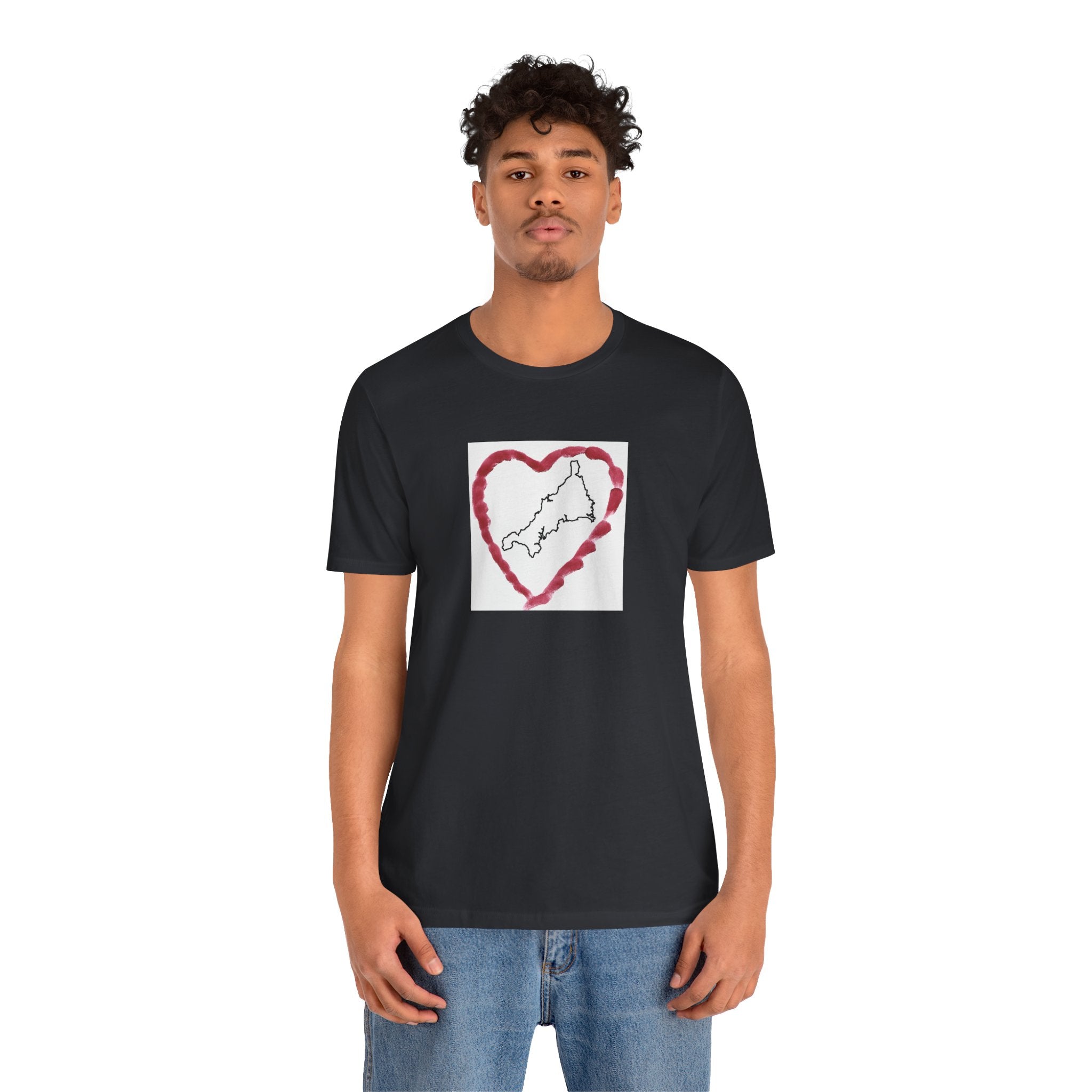 Man wearing I Love Cornwall Black unisex t-shirt — Kernow heart map graphic tee