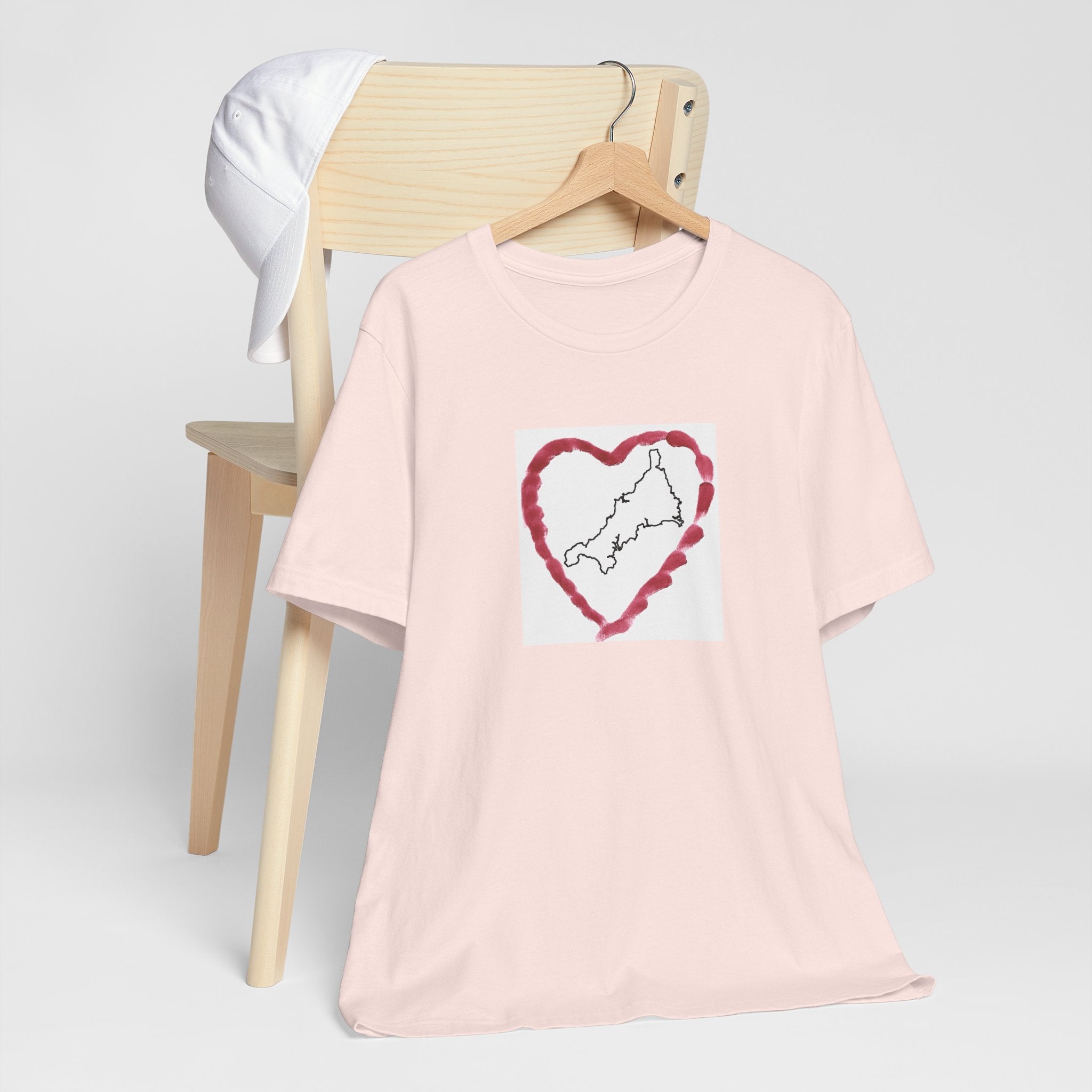 Pink Cornwall graphic t-shirt with Kernow heart map — coastal lifestyle tee