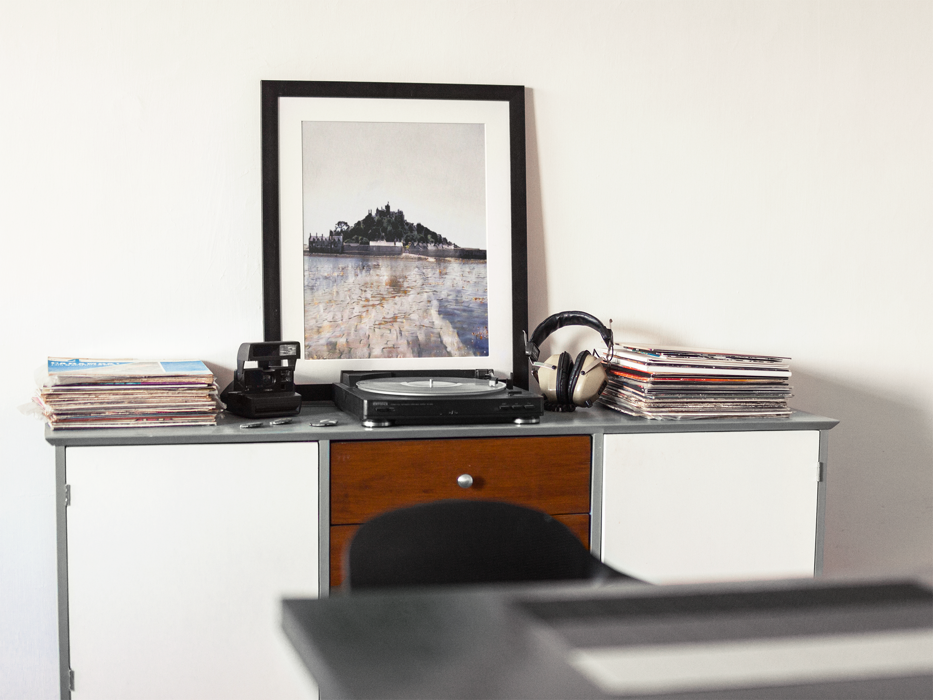 St Michael's Mount poster above sideboard in neutral Japandi living room