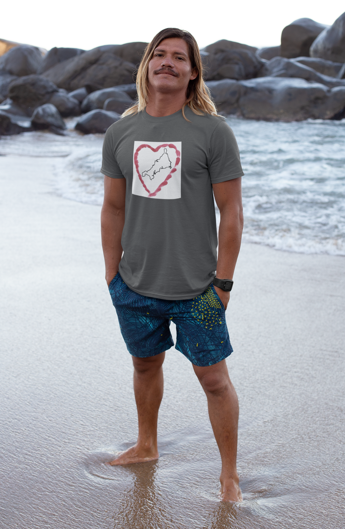 Surfer in Asphalt grey I Love Cornwall tee — Kernow heart graphic unisex shirt