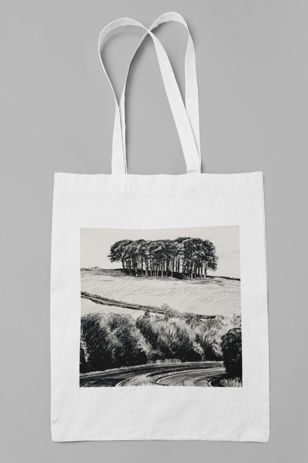White cotton tote bag with Nearly There Trees Cornwall illustration