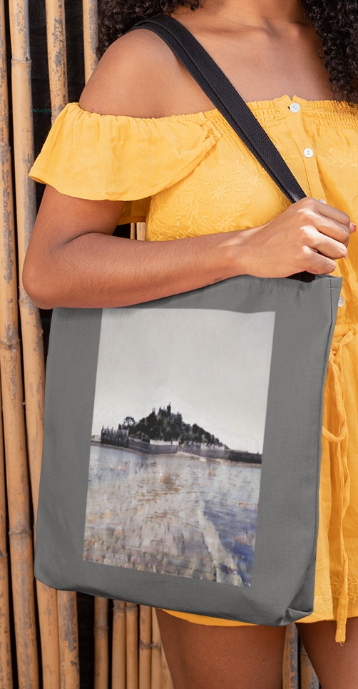 Woman carrying Grey St Michael's Mount tote bag over shoulder — Cornwall cotton shopper