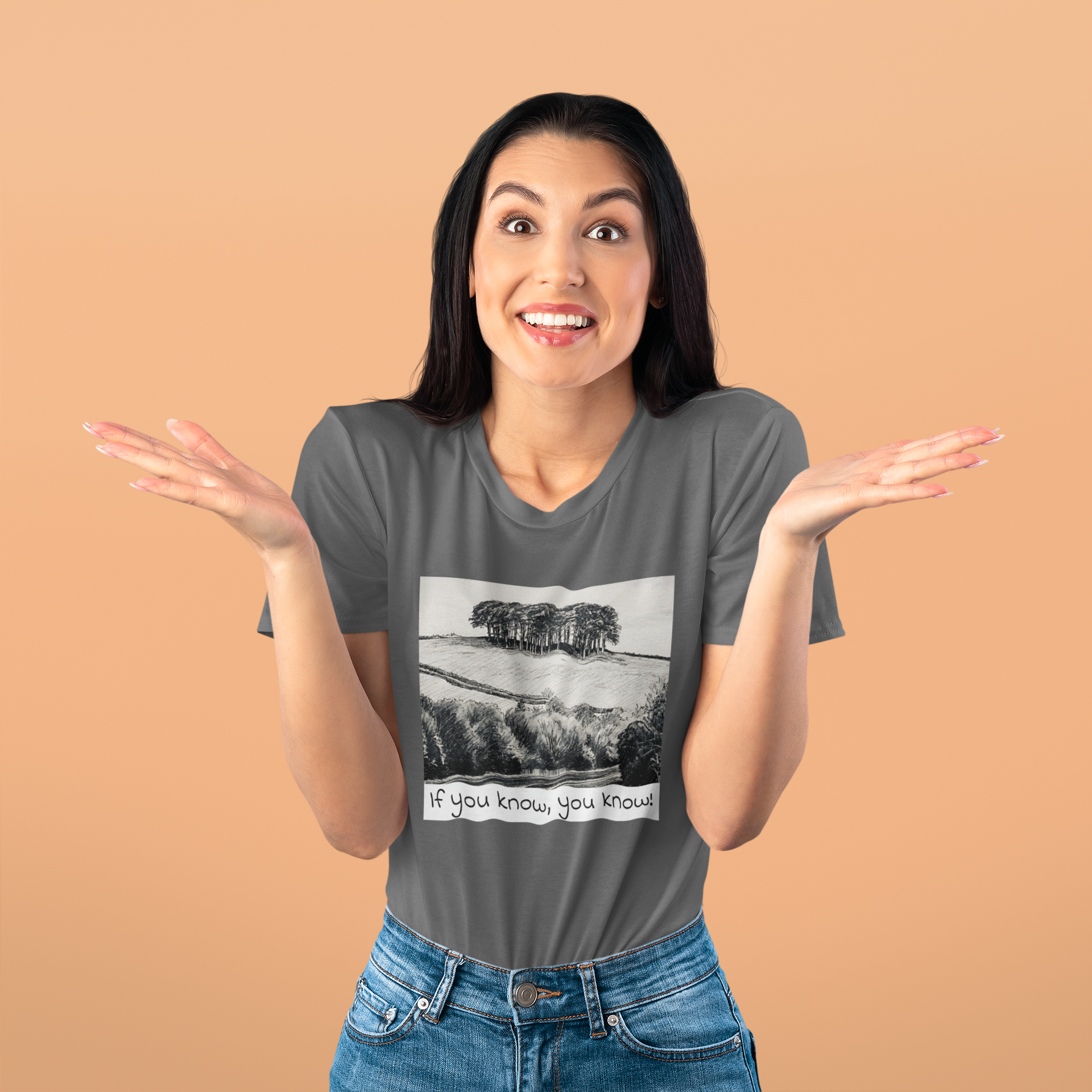 Woman wearing Asphalt Nearly There Trees graphic tee, Cornwall holiday t-shirt