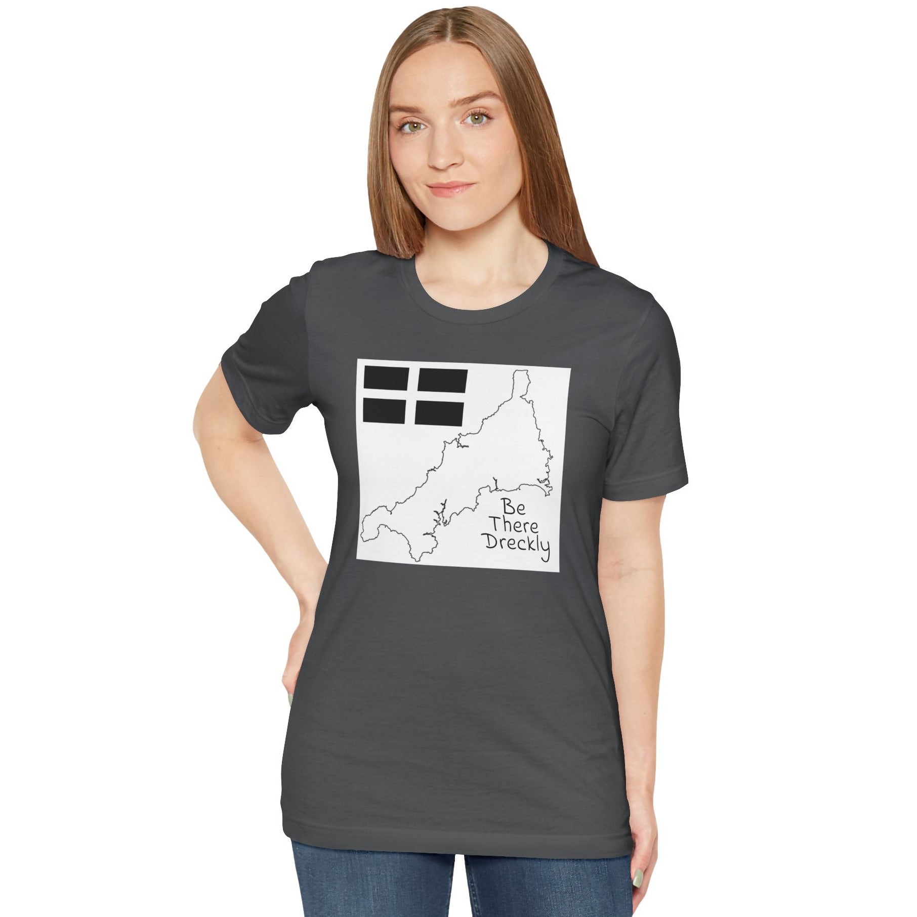 Woman wearing asphalt Be There Dreckly Cornwall graphic tee with jeans