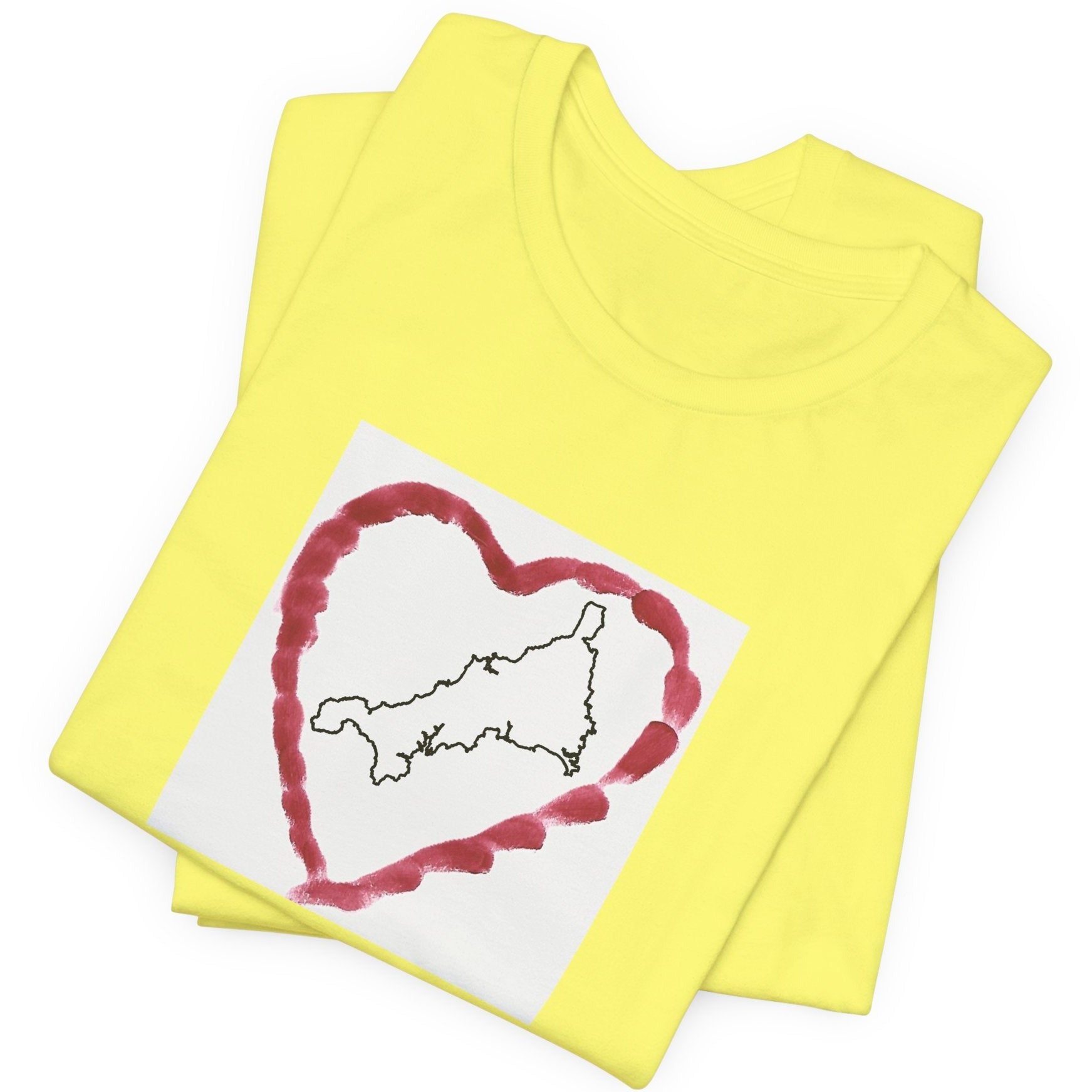 Yellow Cornwall graphic t-shirt with Kernow heart map — coastal lifestyle tee