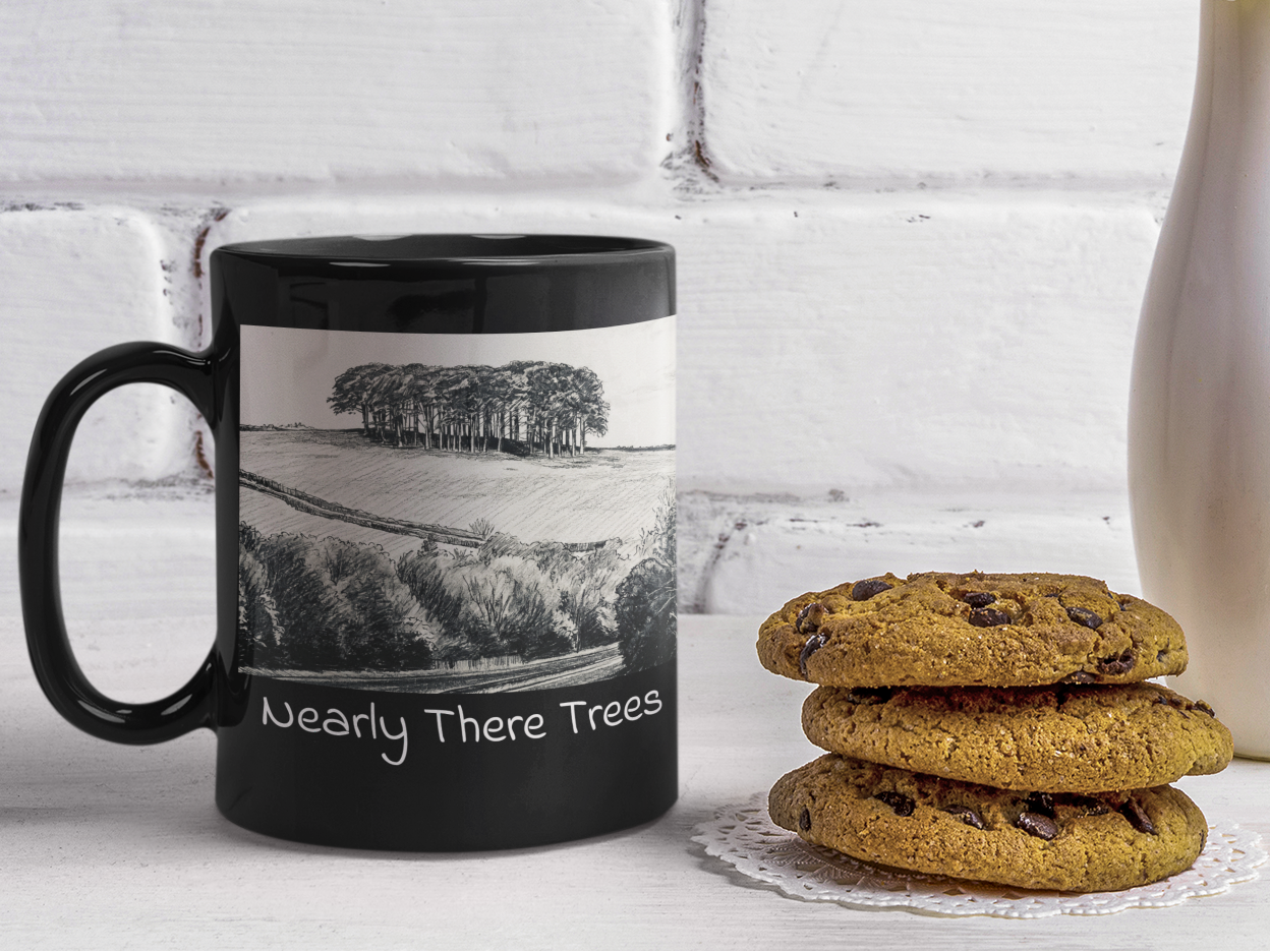 Nearly There Trees all-black mug with chocolate chip cookies and milk, Cornwall tree sketch design