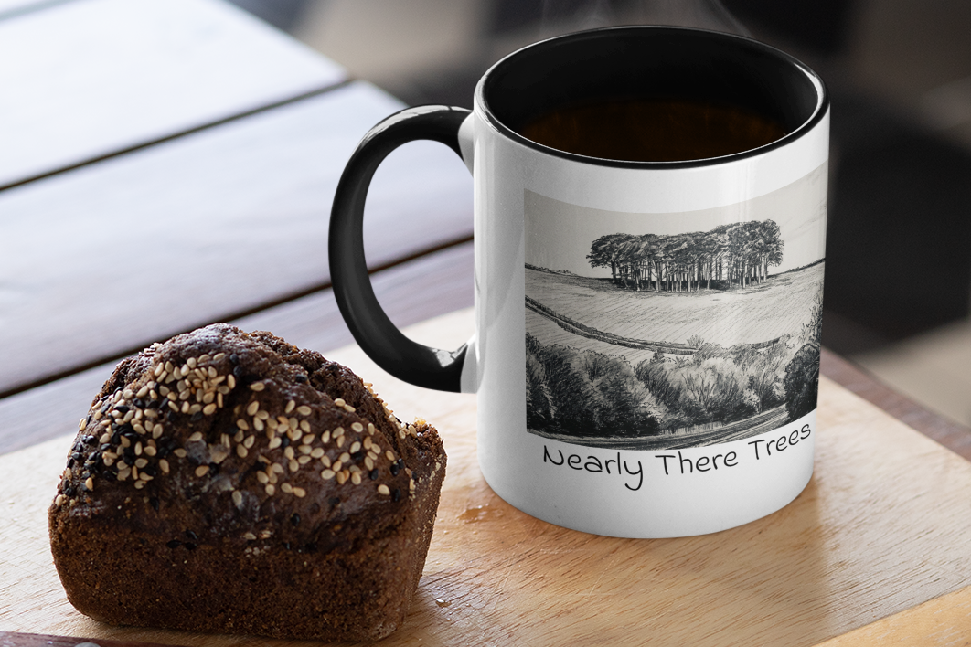 Nearly There Trees black mug with steaming coffee beside muffin, Cornwall tree landscape sketch design